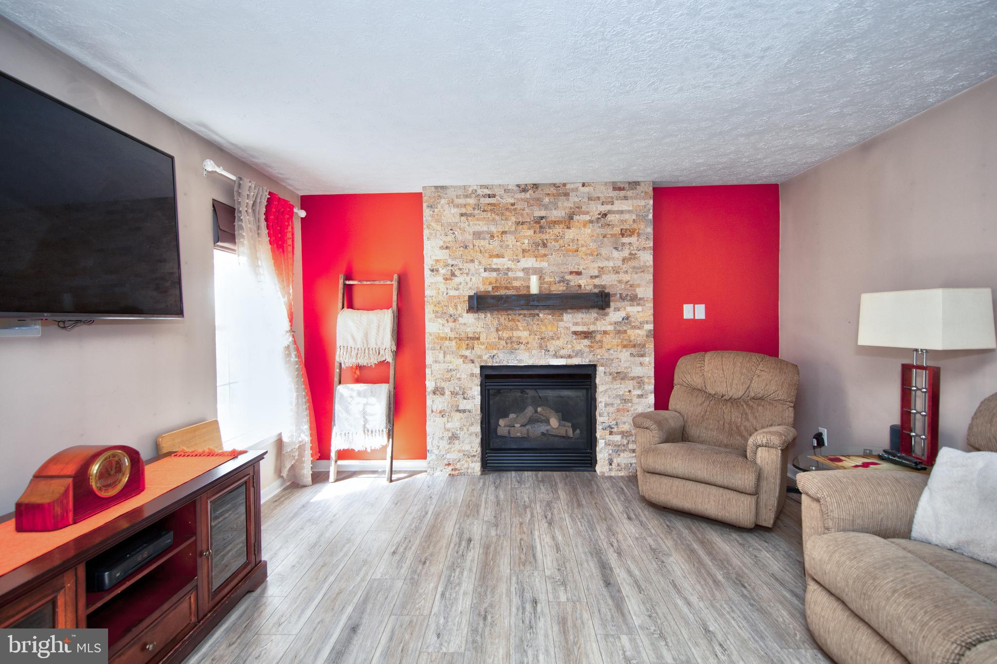 307 Powdersby Road Joppa, MD 21085 - Photo 17 of 45 Family room with gas fireplace