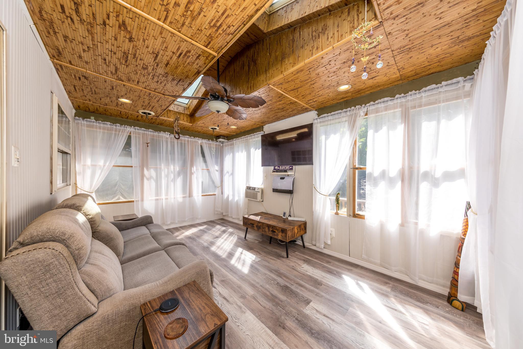 307 Powdersby Road Joppa, MD 21085 - Photo 19 of 45 Screened in porch with skylight