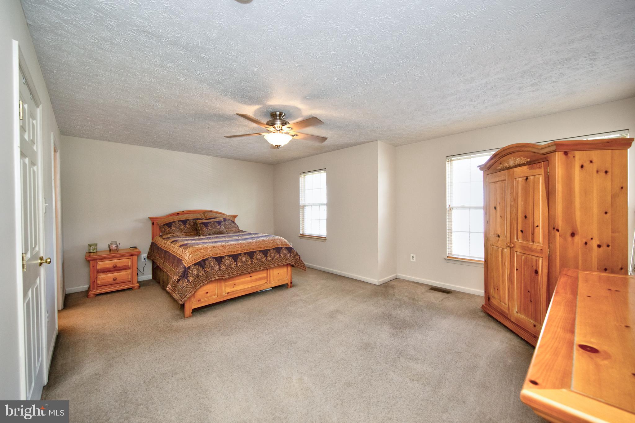 307 Powdersby Road Joppa, MD 21085 - Photo 24 of 45 Primary bedroom with ceiling fan