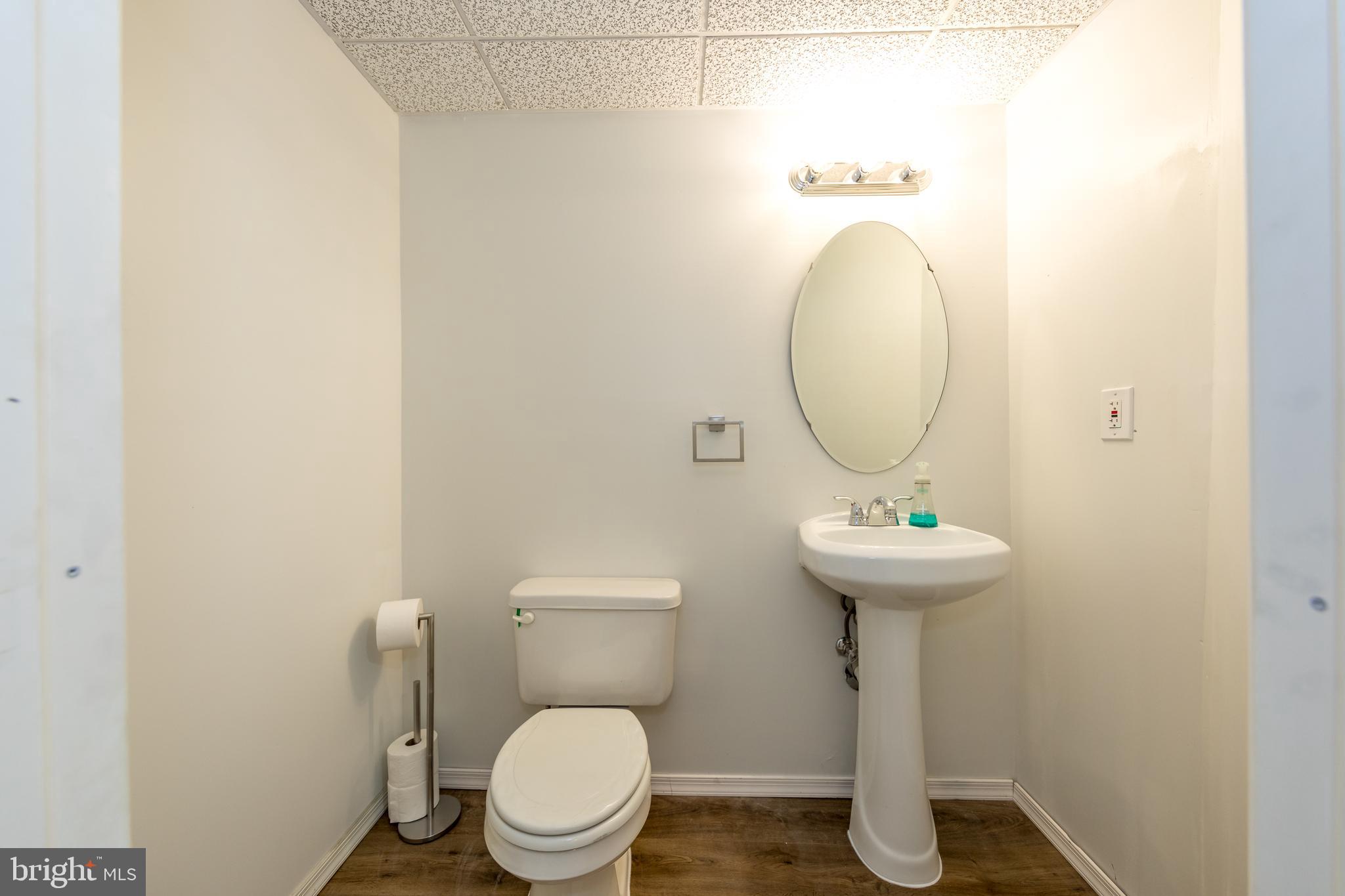 307 Powdersby Road Joppa, MD 21085 - Photo 34 of 45 Lower level 1/2 bathroom