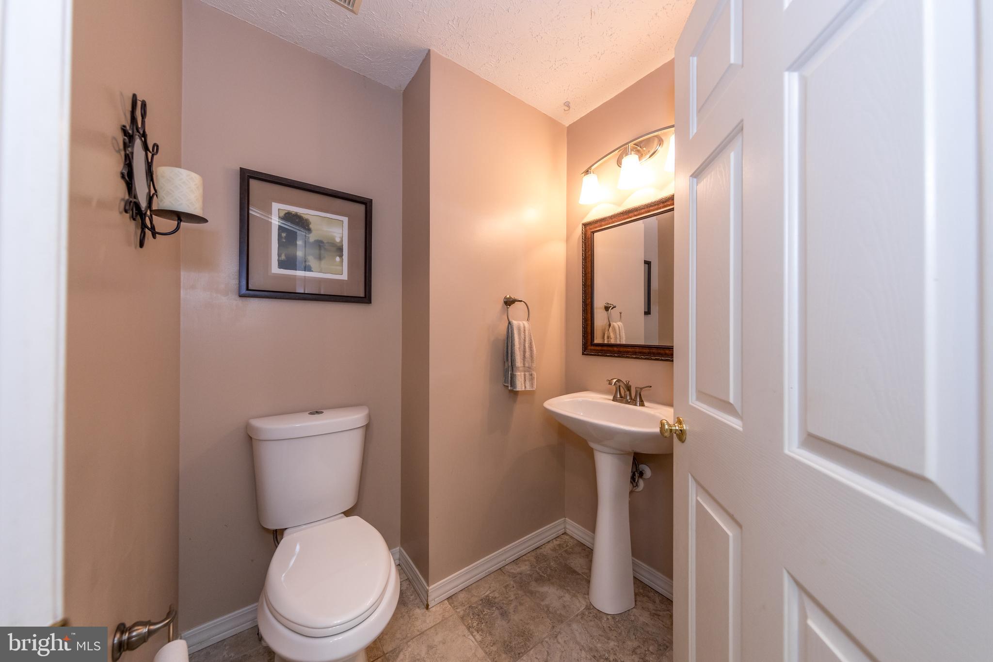 307 Powdersby Road Joppa, MD 21085 - Photo 9 of 45 Main level 1/2 bath