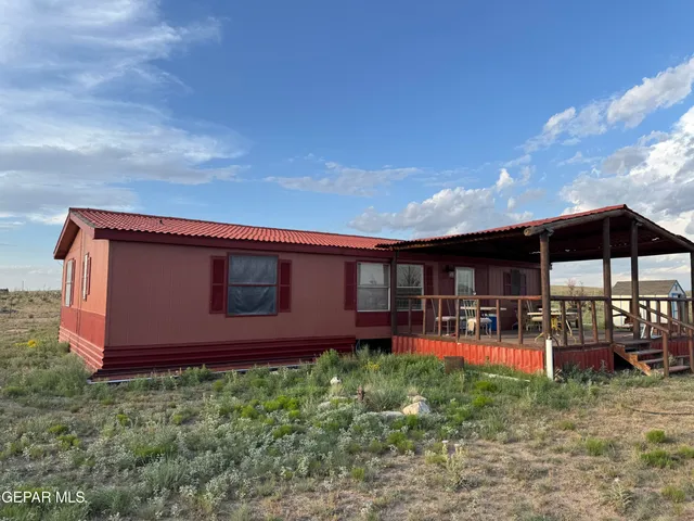 a front view of house with yard