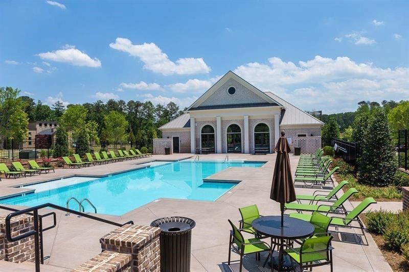 20006 Windalier Way Roswell, GA 30076 - Photo 45 of 58 a view of a house with backyard and swimming pool