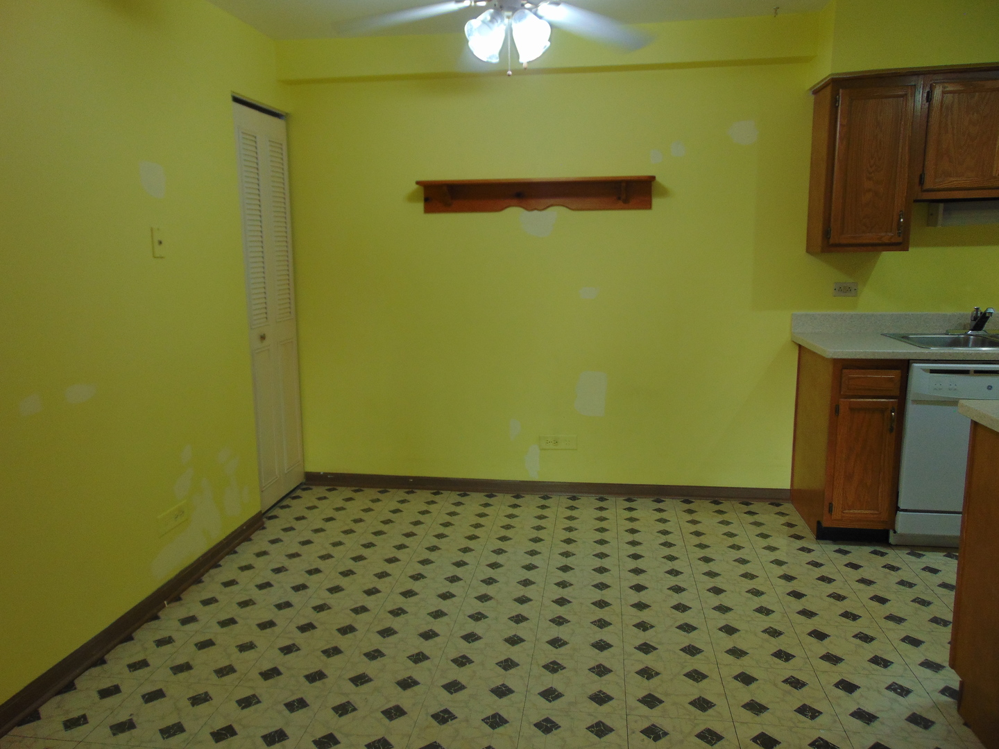 10428 Ridgeland Avenue, Unit 6 Chicago Ridge, IL 60415 - Photo 7 of 11 a bathroom with a sink a toilet and a mirror