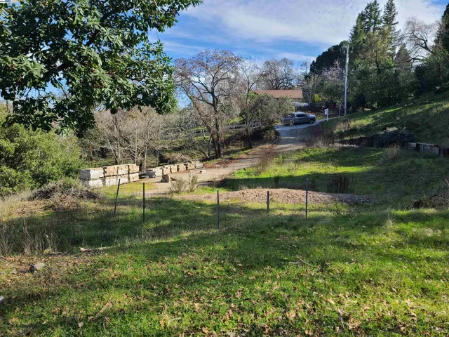a view of swimming pool from a yard