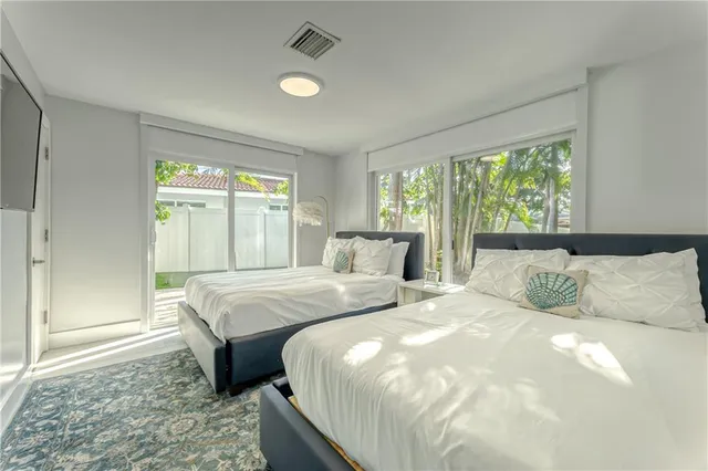 a view of a hallway with a living room