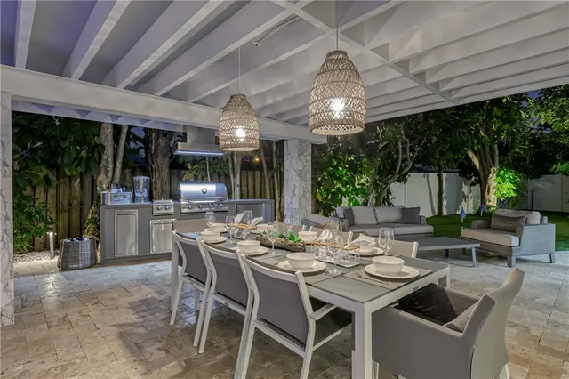 a living room with furniture and a table