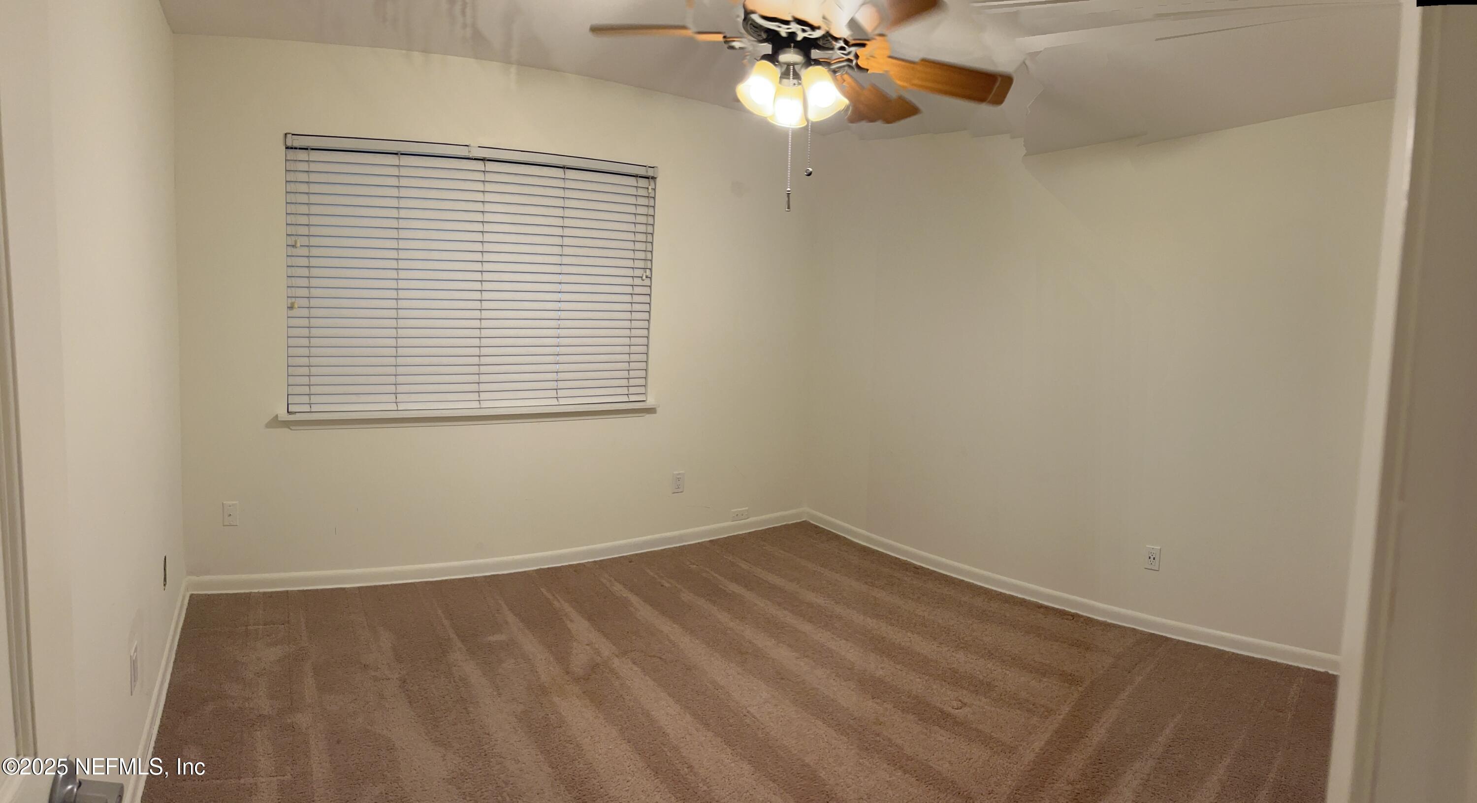 1809 Kings Way Neptune Beach, FL 32266 - Photo 20 of 28 an empty room with a window
