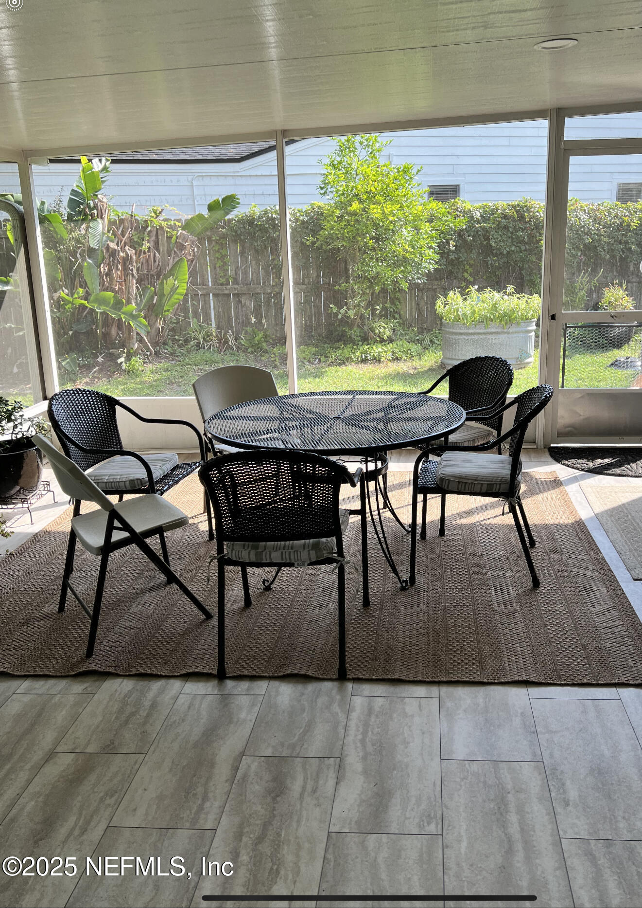 1809 Kings Way Neptune Beach, FL 32266 - Photo 27 of 28 a dining room with furniture and wooden floor