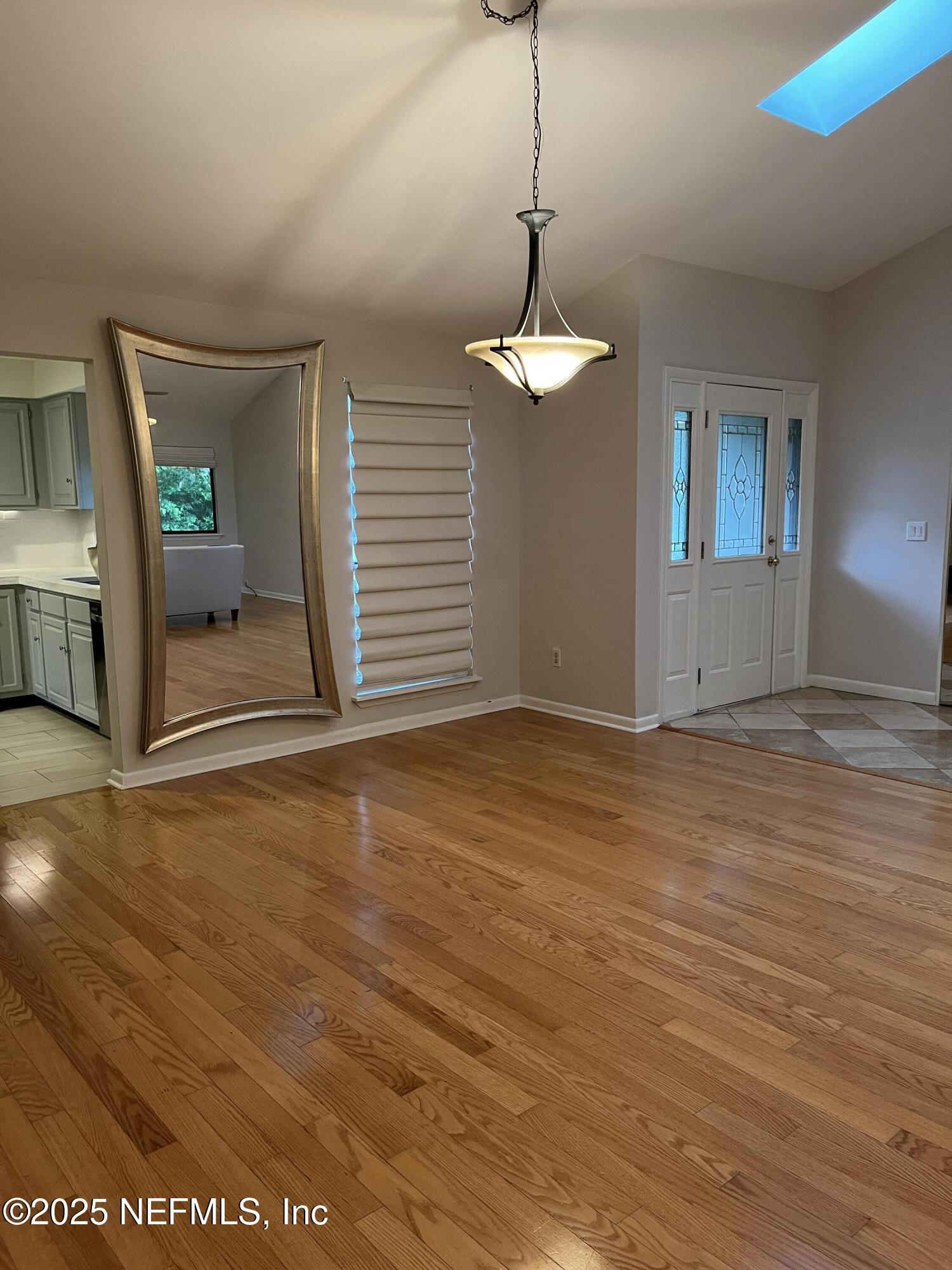 1809 Kings Way Neptune Beach, FL 32266 - Photo 4 of 28 a view of empty room with wooden floor