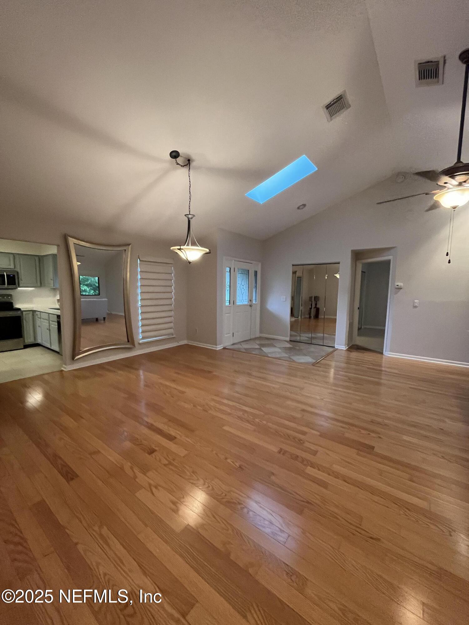 1809 Kings Way Neptune Beach, FL 32266 - Photo 5 of 28 a view of empty room with wooden floor
