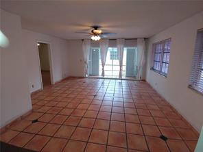 3720 Harrison Street, Unit 3 Hollywood, FL 33021 - Photo 4 of 8 a view of an empty room with a window