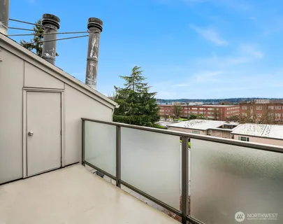 a view of a balcony with an outdoor space