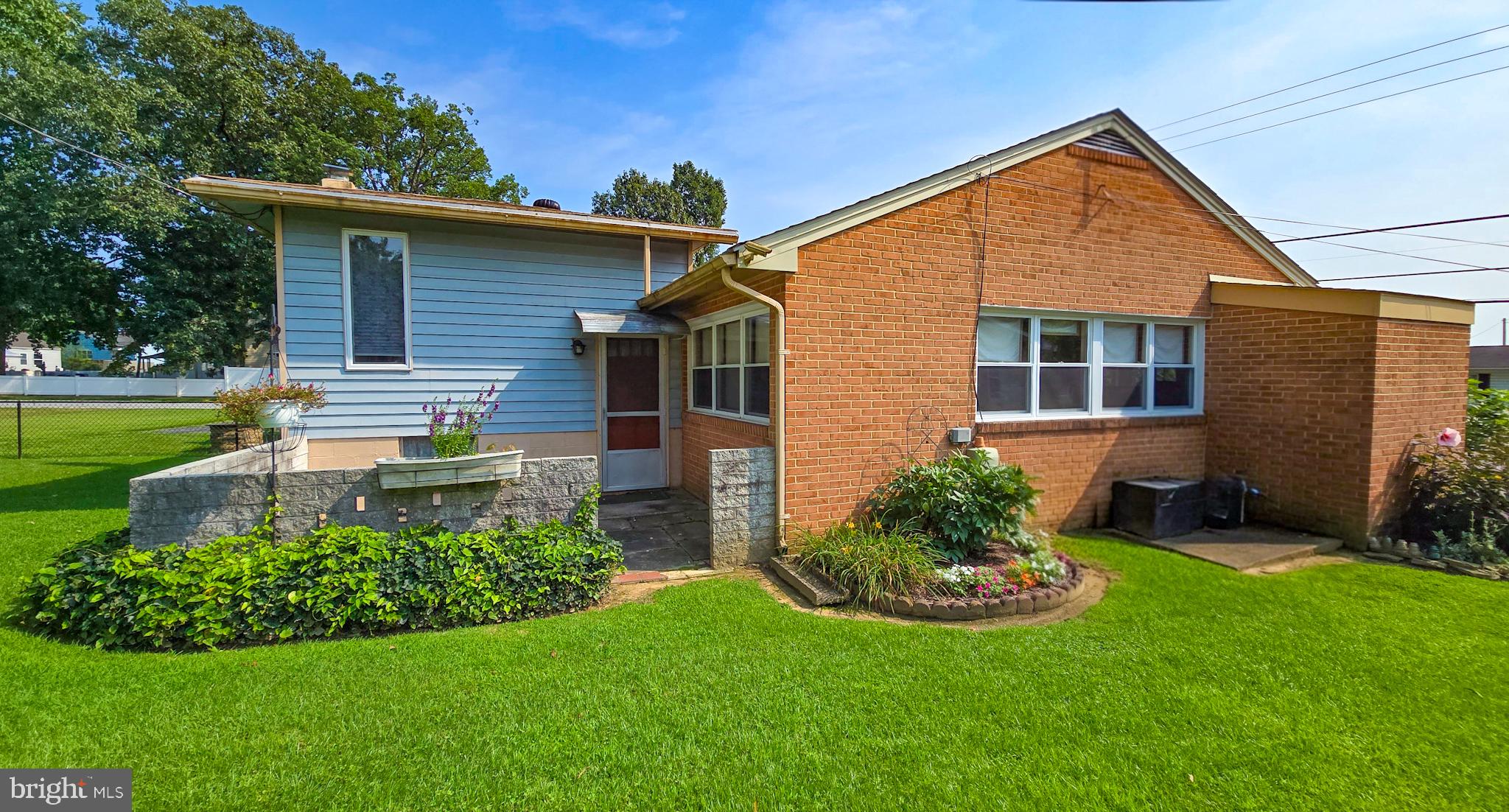 1217 Shore Road Middle River, MD 21220 - Photo 28 of 62 Lush Lawn with Beautiful Landscaping