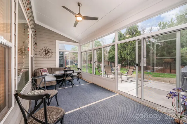 a very nice looking living room with a large window