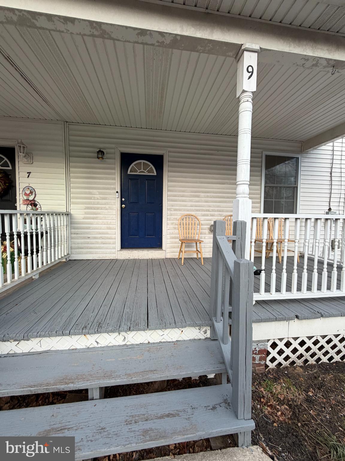 9 Hartford Road Mount Laurel, NJ 08054 - Photo 2 of 37 a view of a wooden door with a bench