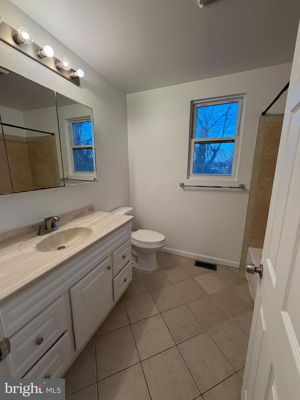 9 Hartford Road Mount Laurel, NJ 08054 - Photo 21 of 37 a bathroom with a granite countertop sink mirror vanity and toilet