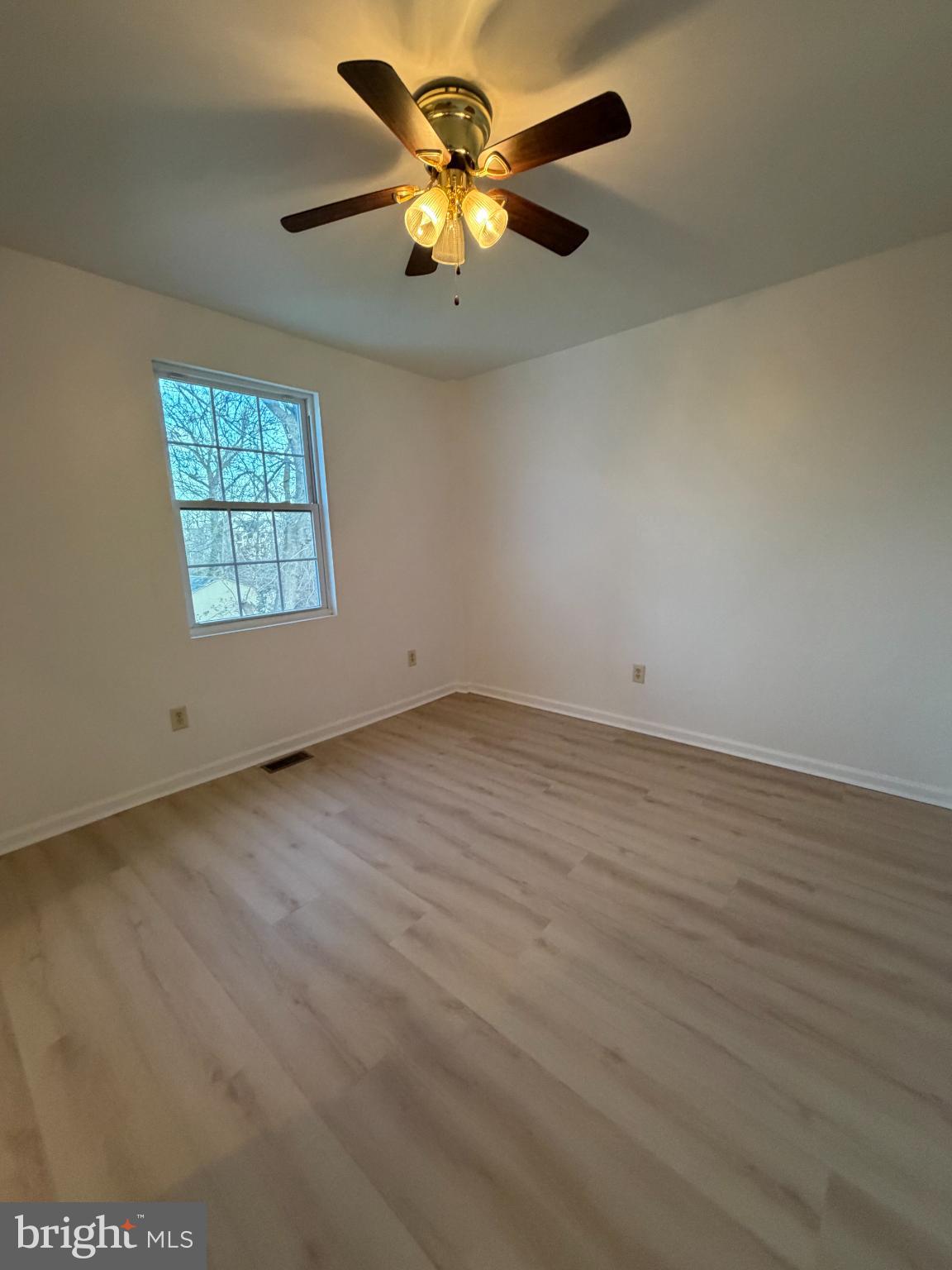 9 Hartford Road Mount Laurel, NJ 08054 - Photo 26 of 37 wooden floor in an empty room with a window