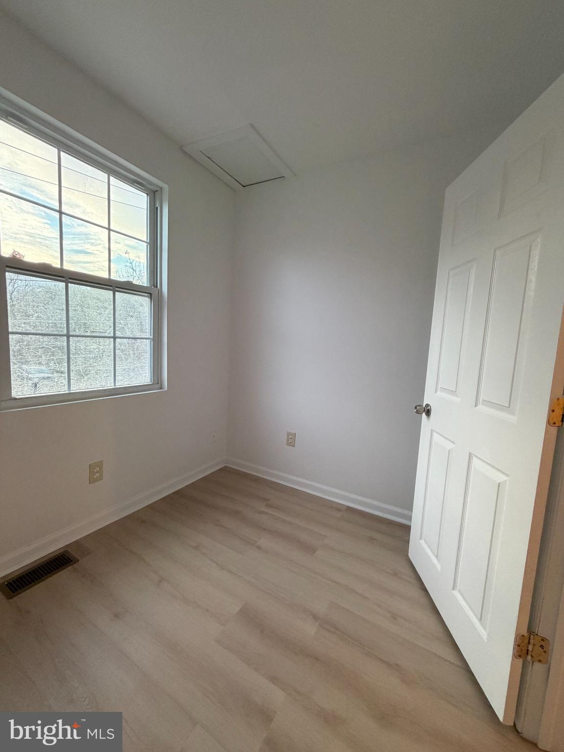 9 Hartford Road Mount Laurel, NJ 08054 - Photo 34 of 37 an empty room with wooden floor and windows