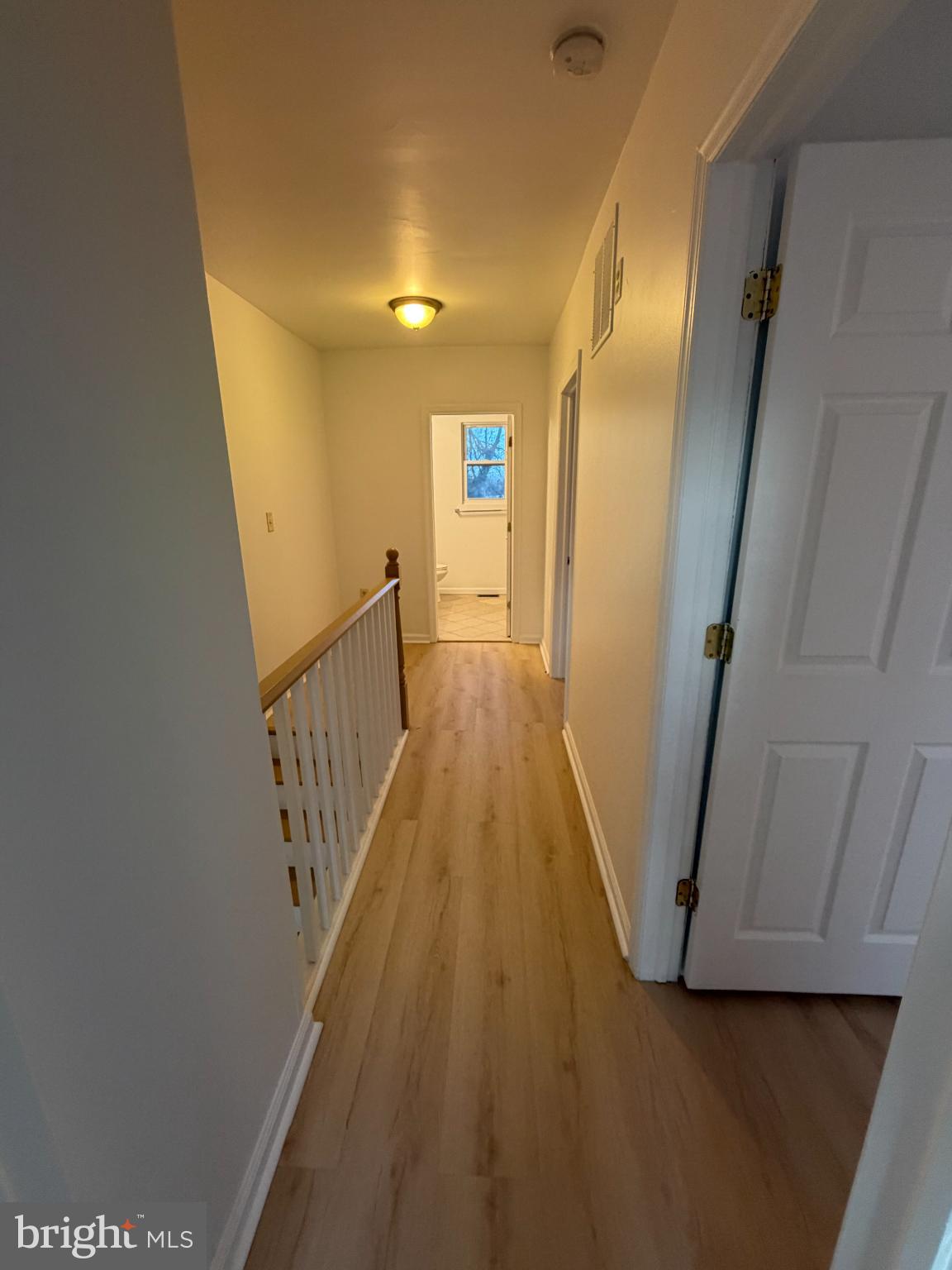 9 Hartford Road Mount Laurel, NJ 08054 - Photo 37 of 37 a view of a hallway with wooden floor and stairs