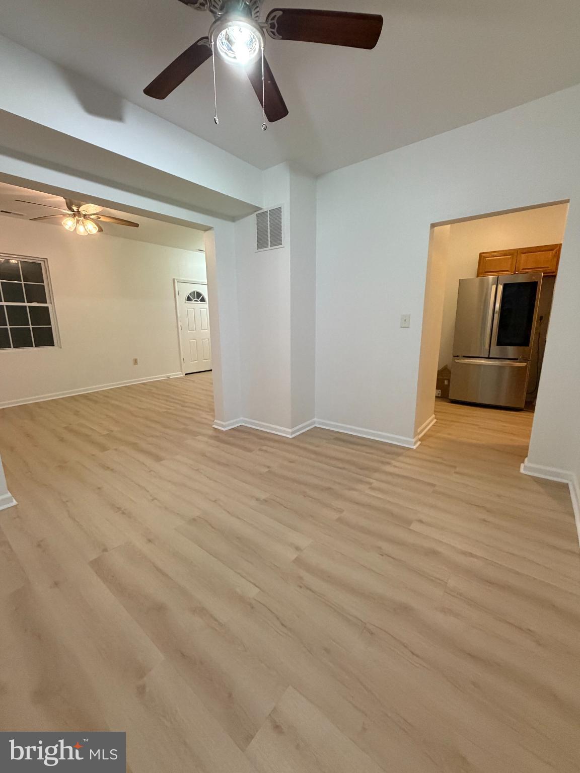9 Hartford Road Mount Laurel, NJ 08054 - Photo 10 of 37 a view of an empty room with wooden floor and a window