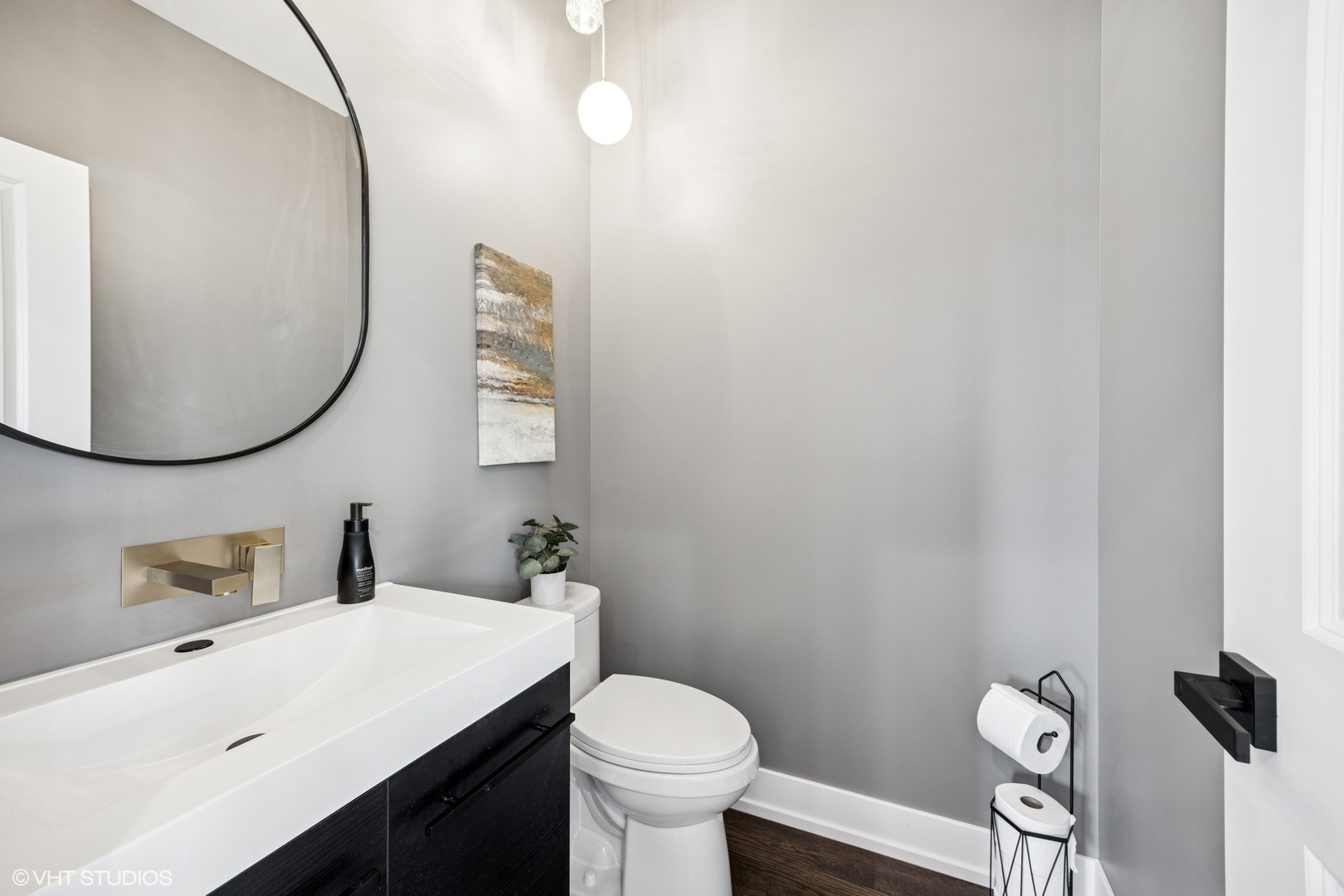 8524 Center Avenue River Grove, IL 60171 - Photo 16 of 38 a bathroom with a sink mirror and toilet