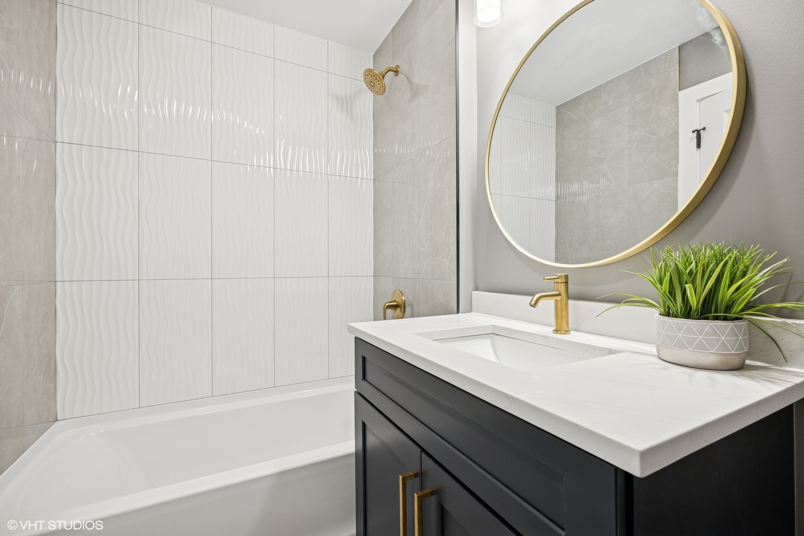 8524 Center Avenue River Grove, IL 60171 - Photo 21 of 38 a bathroom with a sink a vanity and a mirror