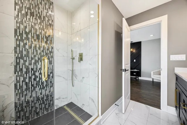 walk in closet with white walls