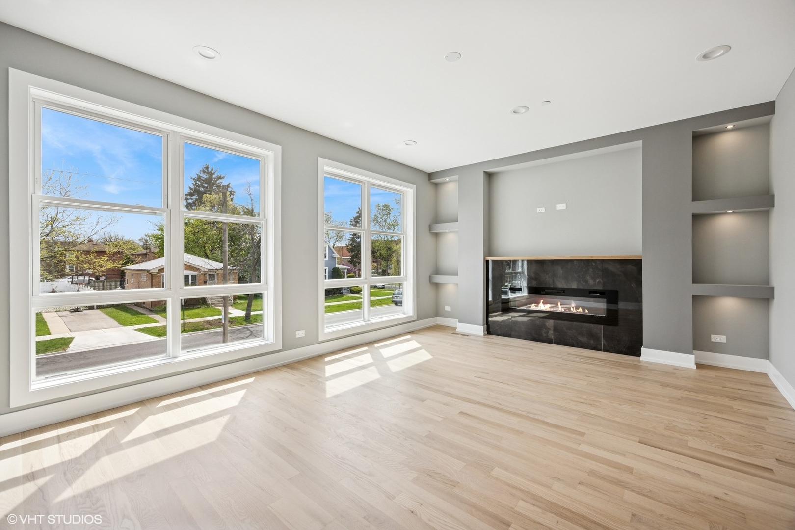8524 Center Avenue River Grove, IL 60171 - Photo 29 of 38 a view of livingroom with furniture flat screen tv and floor to ceiling window