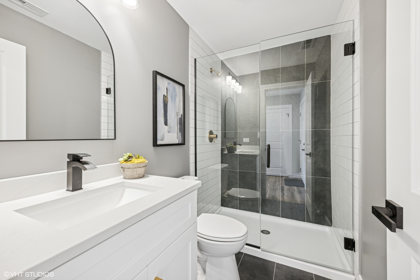 8524 Center Avenue River Grove, IL 60171 - Photo 5 of 38 a bathroom with a sink a toilet and shower