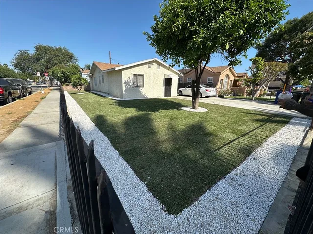 a view of swimming pool with a yard
