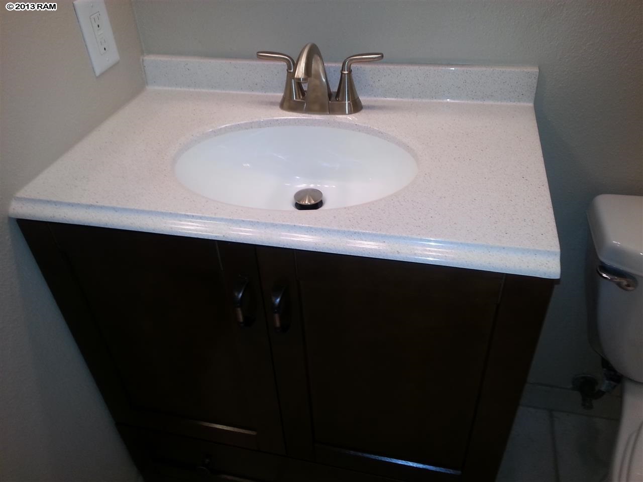 140 Uwapo Road, Unit 9104 Kihei, HI 96753 - Photo 16 of 27 a close up of a sink