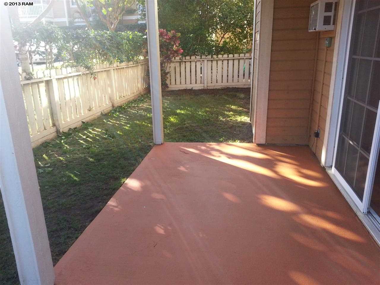 140 Uwapo Road, Unit 9104 Kihei, HI 96753 - Photo 23 of 27 a view of a porch with a yard