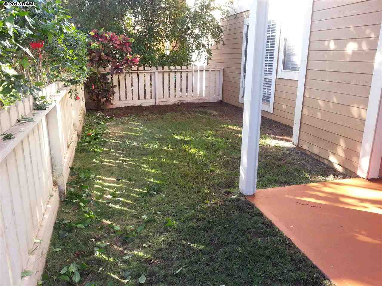 140 Uwapo Road, Unit 9104 Kihei, HI 96753 - Photo 25 of 27 a view of a pathway of a house with a yard