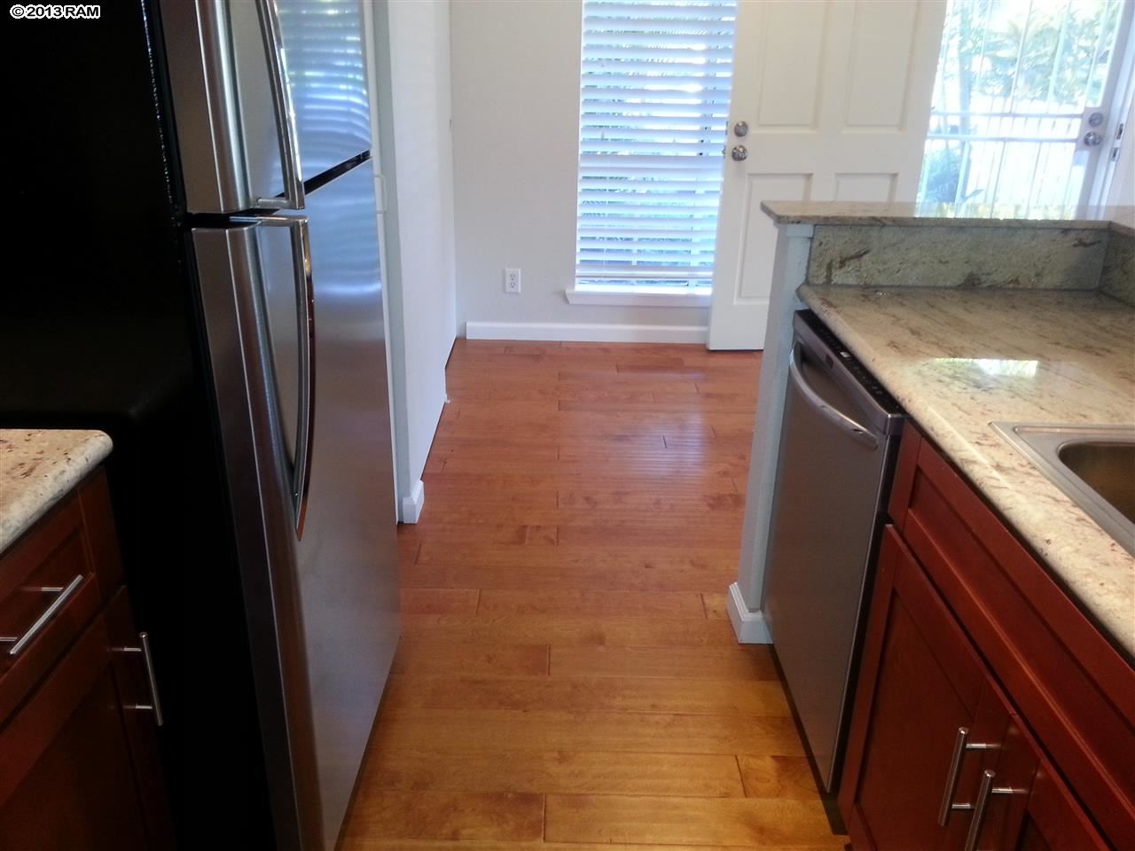 140 Uwapo Road, Unit 9104 Kihei, HI 96753 - Photo 9 of 27 a view of a kitchen from the kitchen