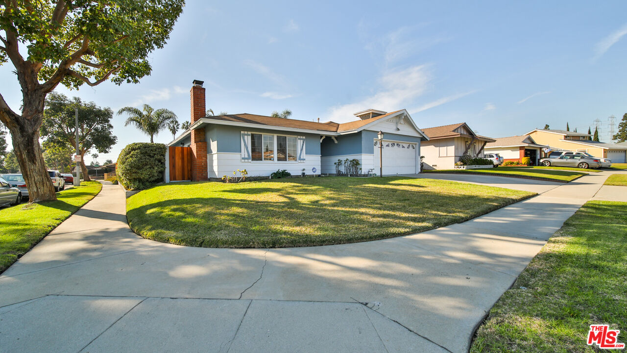 16953 Roa Drive Carson, CA 90746 - Photo 1 of 48 a view of residential houses with yard and swimming pool