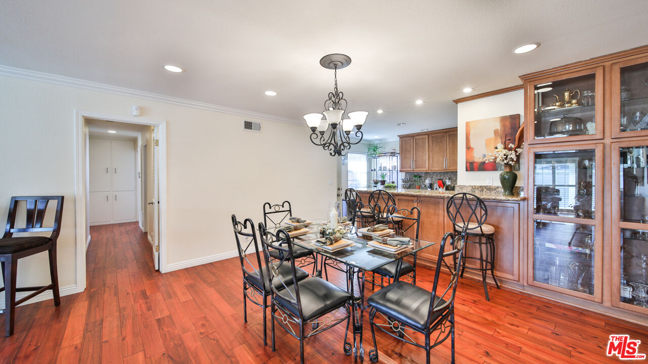 16953 Roa Drive Carson, CA 90746 - Photo 16 of 48 a view of a dining room with furniture and wooden floor