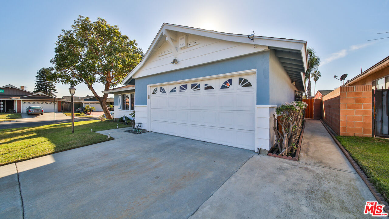 16953 Roa Drive Carson, CA 90746 - Photo 2 of 48 a view of a house with a yard
