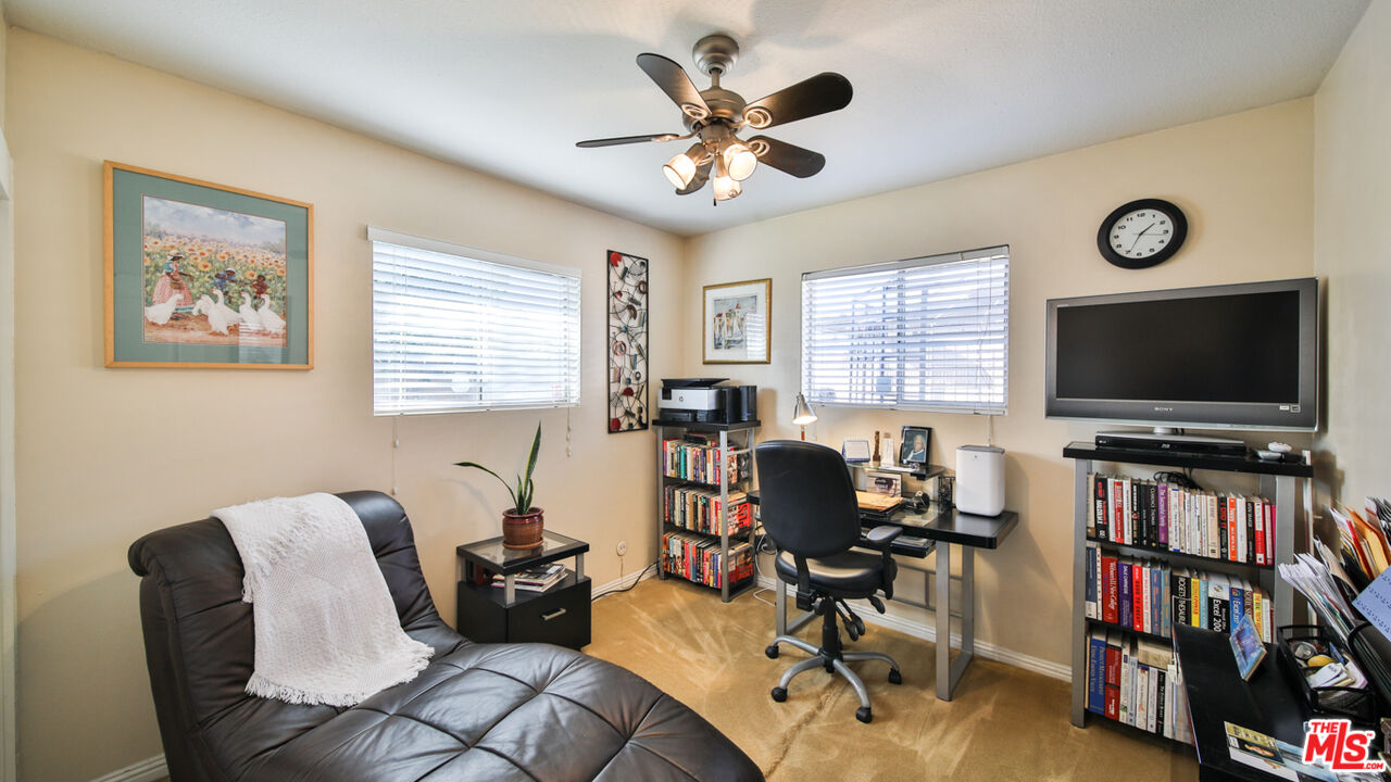 16953 Roa Drive Carson, CA 90746 - Photo 30 of 48 a living room with furniture and a flat screen tv