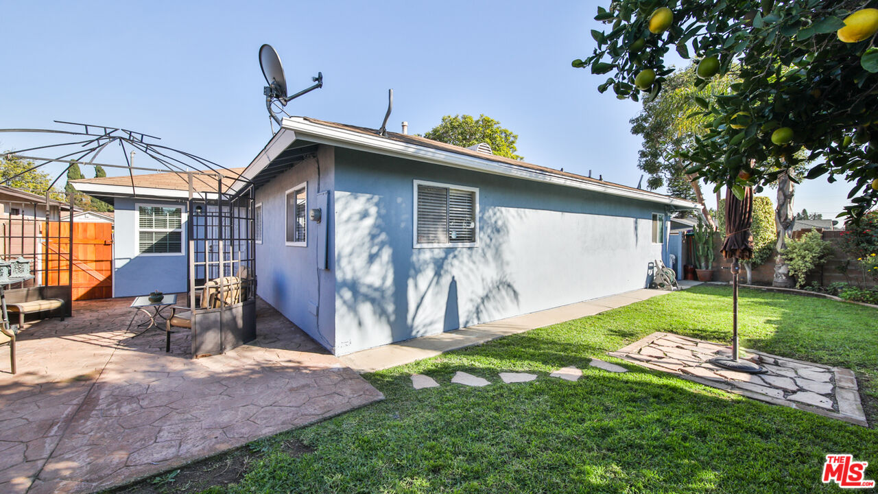 16953 Roa Drive Carson, CA 90746 - Photo 46 of 48 a backyard of a house with table and chairs