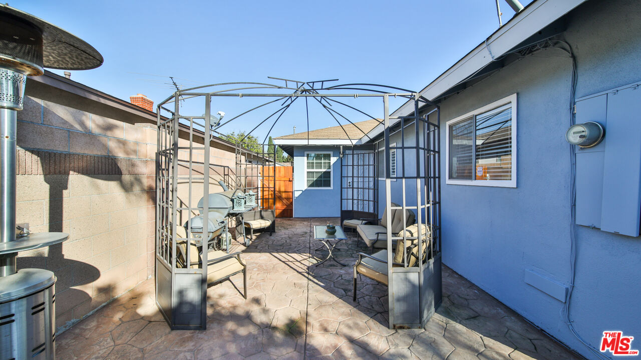 16953 Roa Drive Carson, CA 90746 - Photo 47 of 48 a view of a patio with table and chairs