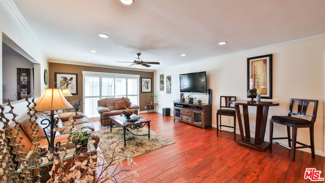 16953 Roa Drive Carson, CA 90746 - Photo 10 of 48 a living room with furniture dining room and wooden floor