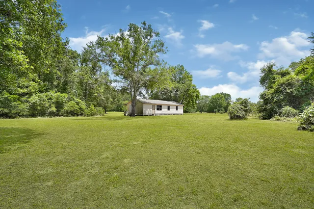 a view of a house with garden