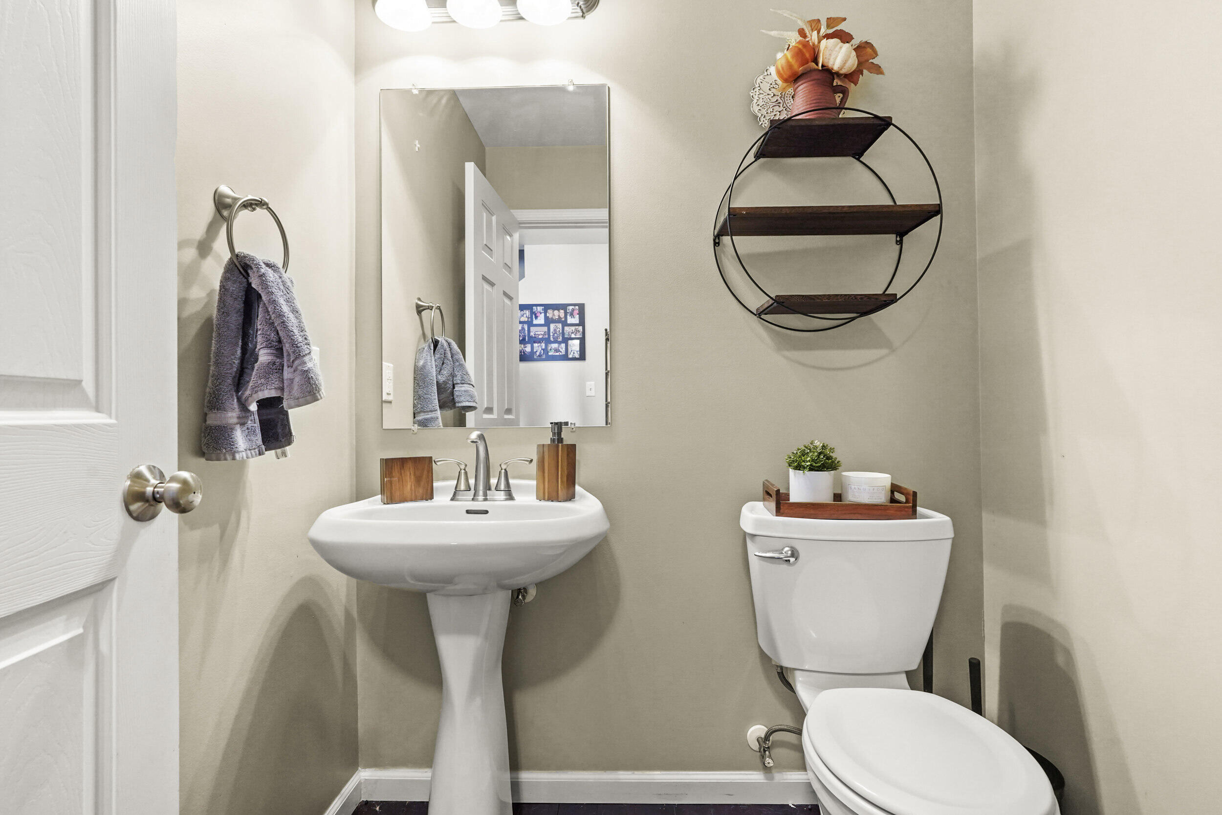 10421 Paramount Way Cedar Lake, IN 46303 - Photo 14 of 26 a bathroom with a toilet sink and mirror