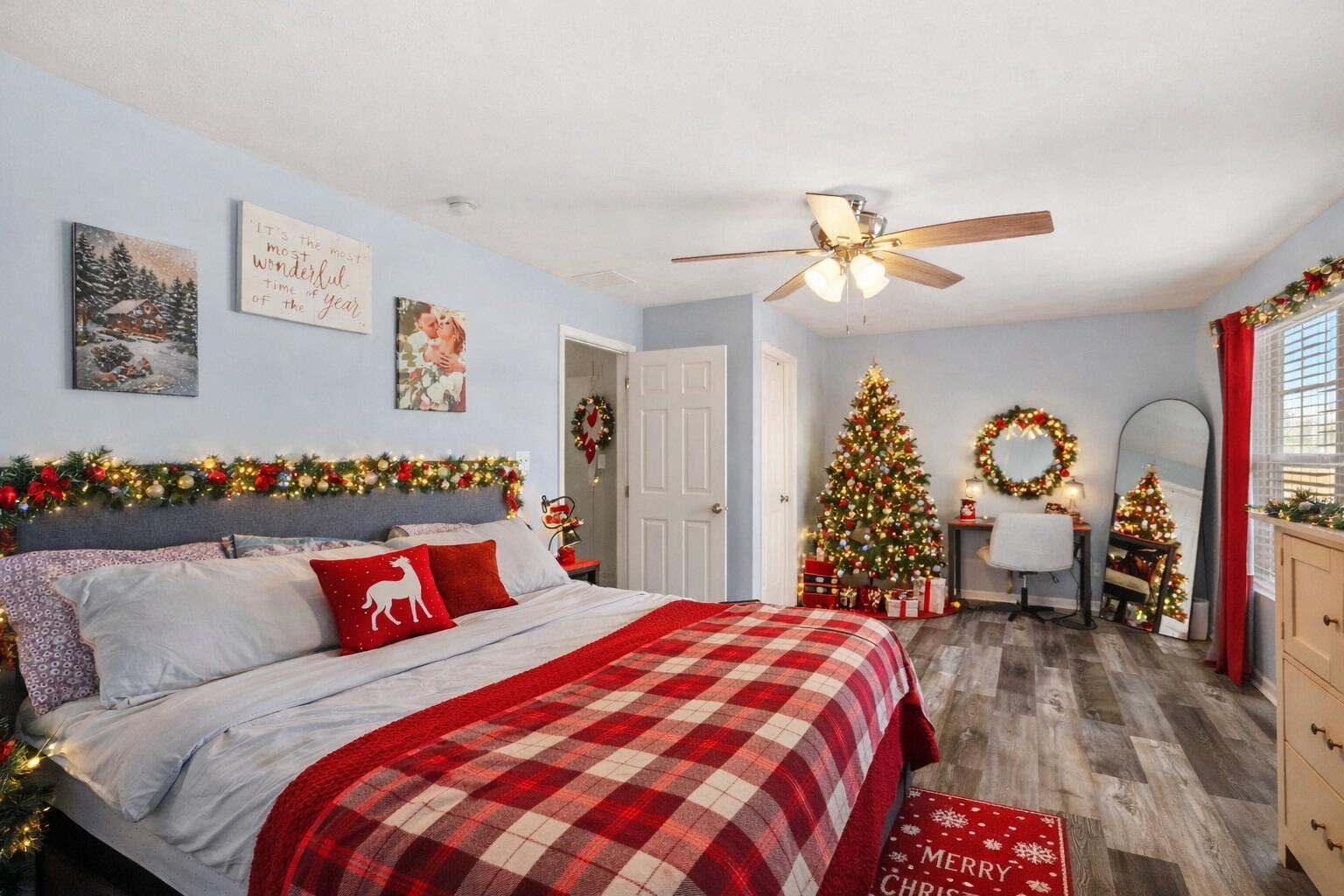 10421 Paramount Way Cedar Lake, IN 46303 - Photo 20 of 26 a bedroom with bed and a chandelier