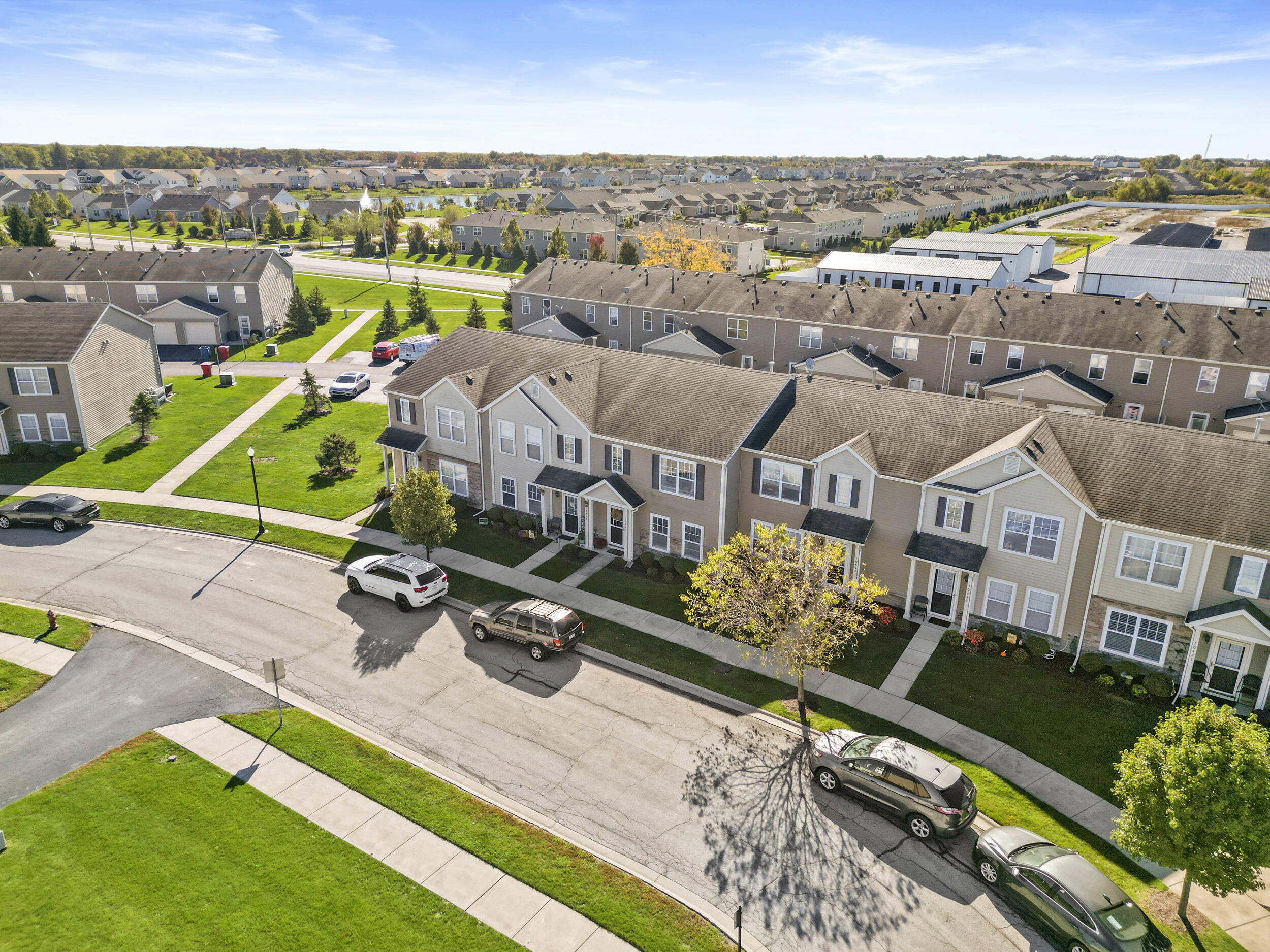 10421 Paramount Way Cedar Lake, IN 46303 - Photo 23 of 26 an aerial view of a house with a garden and lake view