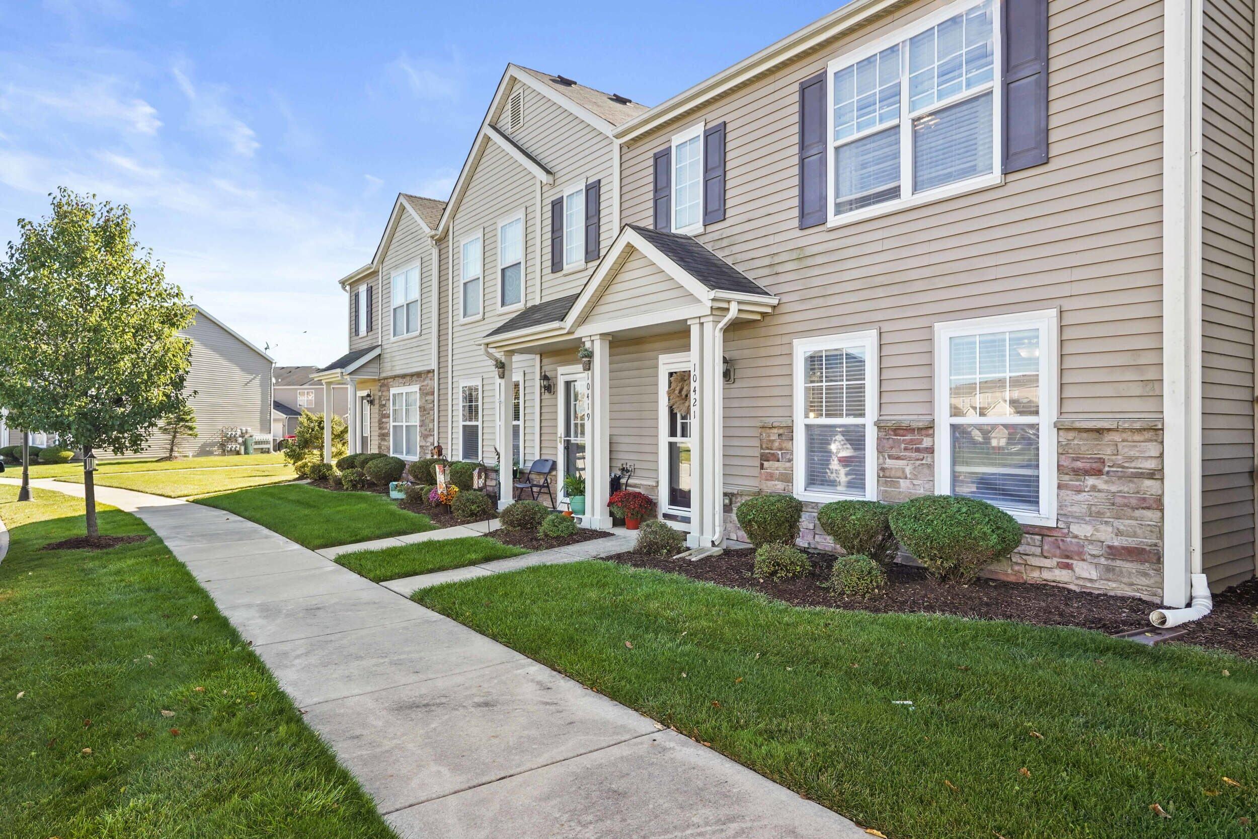 10421 Paramount Way Cedar Lake, IN 46303 - Photo 3 of 26 a front view of a house with yard and green space