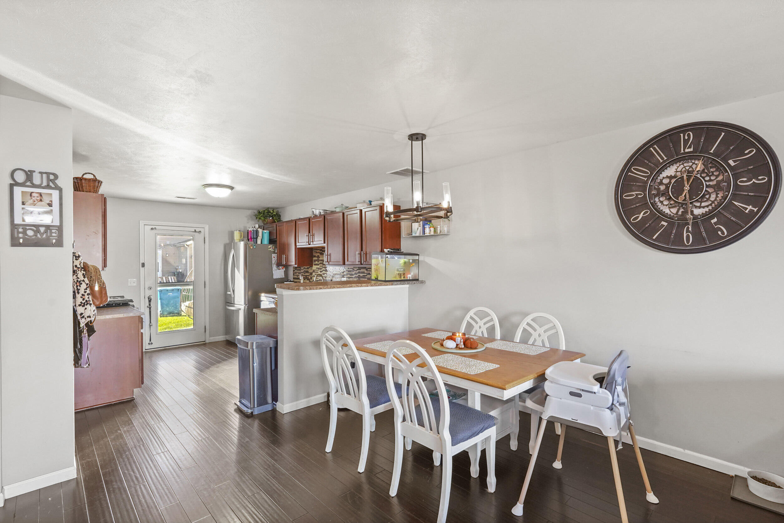 10421 Paramount Way Cedar Lake, IN 46303 - Photo 8 of 26 a view of a dining room with furniture and wooden floor