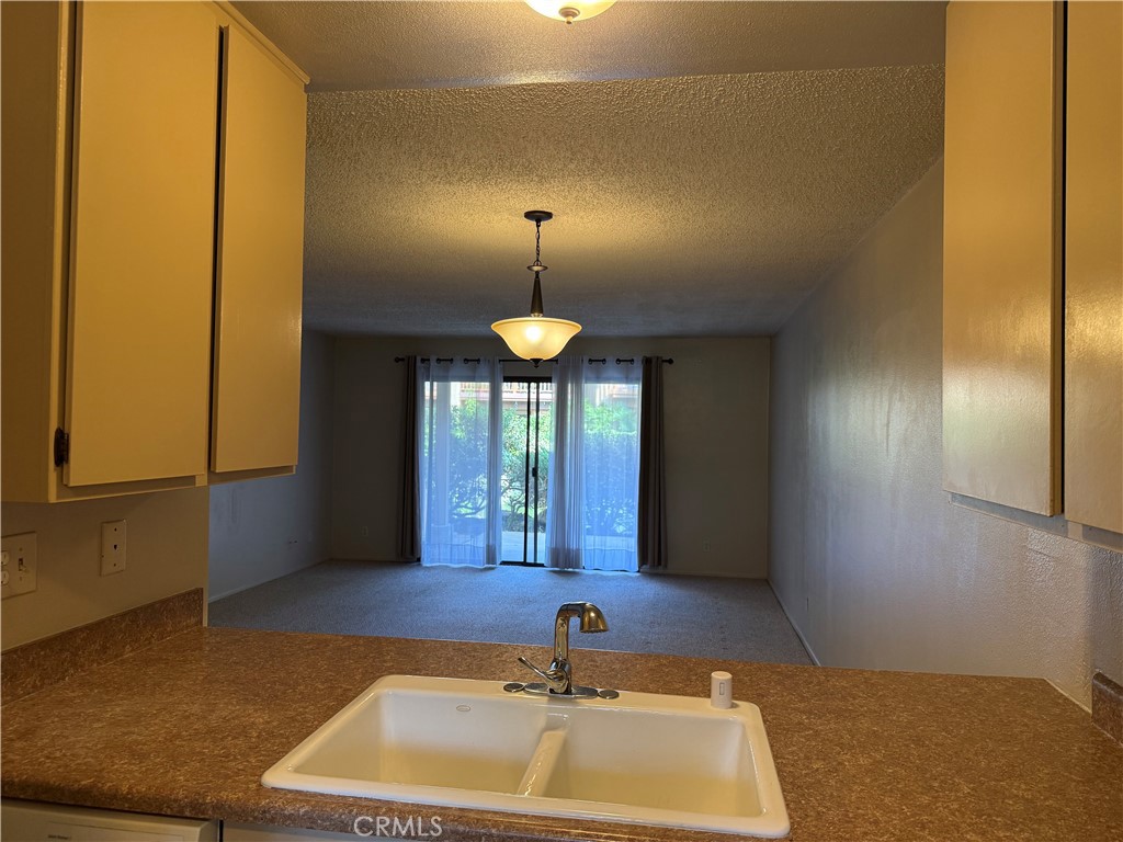 122 Tangelo Irvine, CA 92618 - Photo 14 of 34 a room with pool table and windows