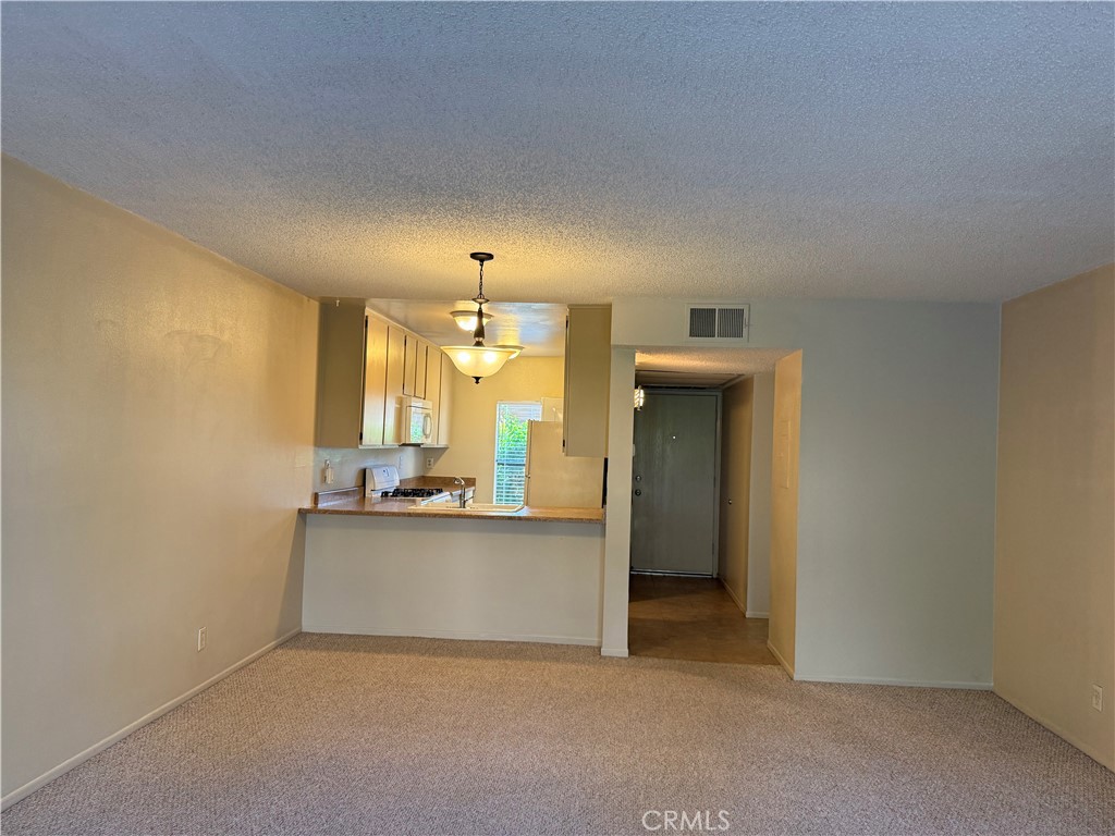 122 Tangelo Irvine, CA 92618 - Photo 17 of 34 a view of a kitchen with a sink